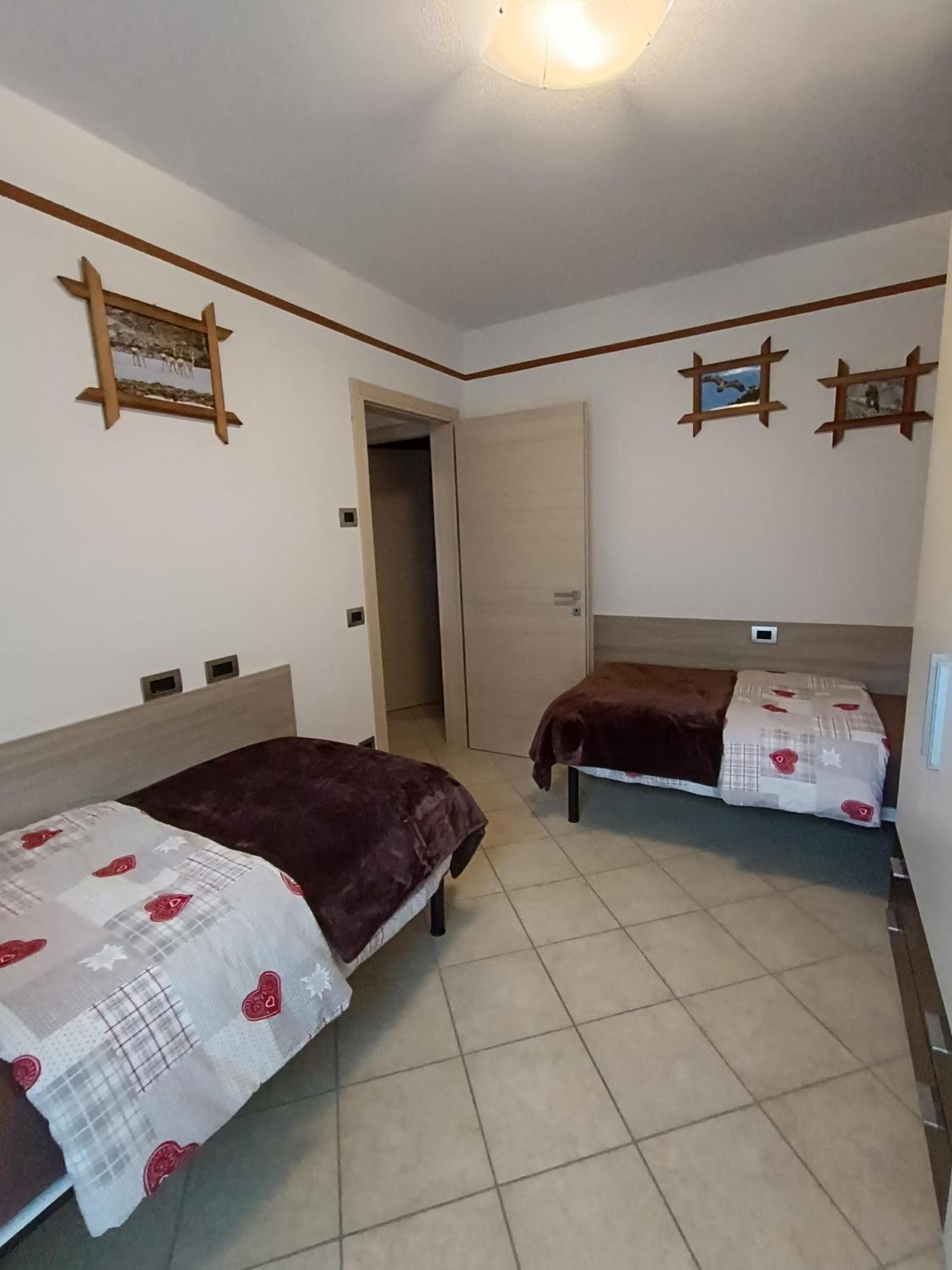 Pisolo Selvaggio Apartman Tirano Szoba fotó